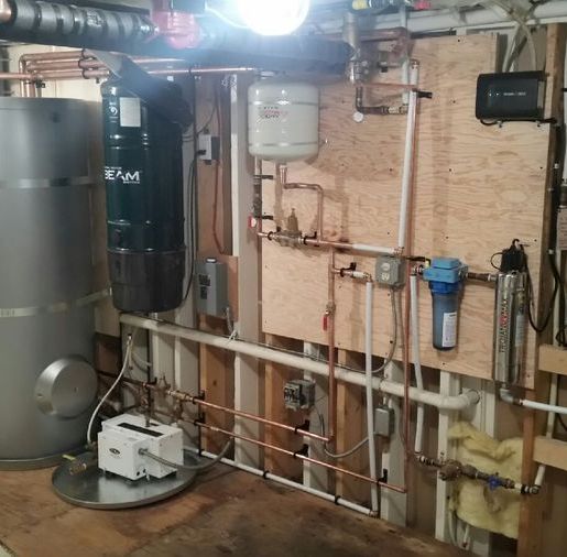 Boiler and pipework pictured in Baker’s plumbing gallery